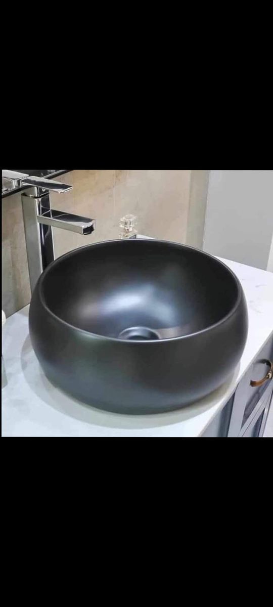 Modern black basin installation