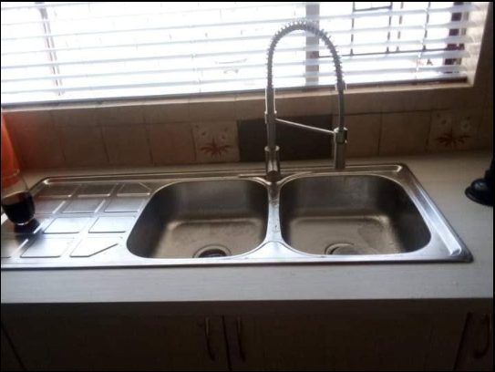 Kitchen sink installation after completion